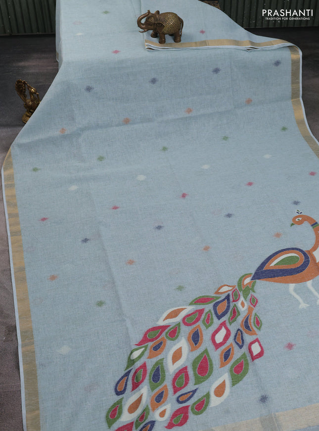 Linen cotton saree pastel blue with allover thread woven buttas and peacock pallu