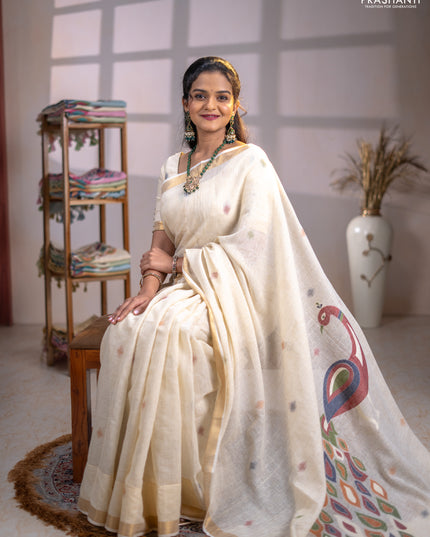 Linen cotton saree cream with allover thread woven buttas and peacock pallu