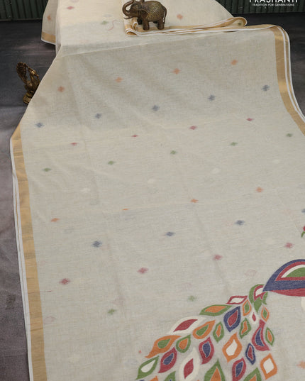 Linen cotton saree cream with allover thread woven buttas and peacock pallu