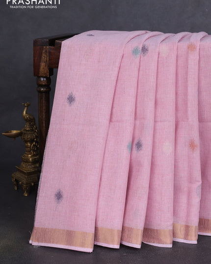 Linen cotton saree light pink with allover thread woven buttas and peacock pallu
