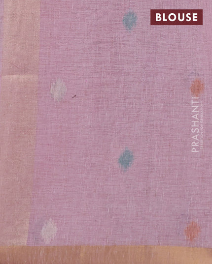 Linen cotton saree light pink with allover thread woven buttas and peacock pallu