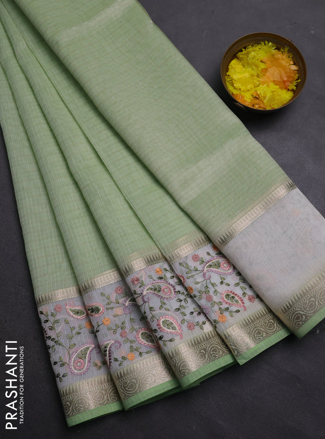 Kota saree pista green and off white with plain body and embroidery work border