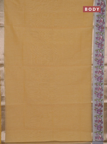 Kota saree yellow and off white with plain body and embroidery work border