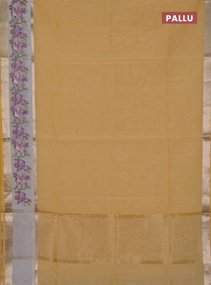 Kota saree yellow and off white with plain body and embroidery work border
