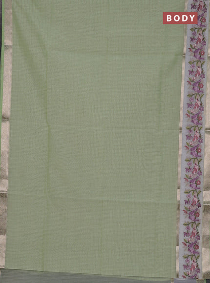 Kota saree pista green and off white with plain body and embroidery work border