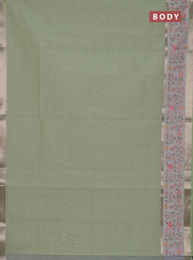 Kota saree pista green and off white with plain body and embroidery work border