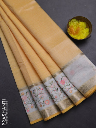 Kota saree yellow and off white with plain body and embroidery work border