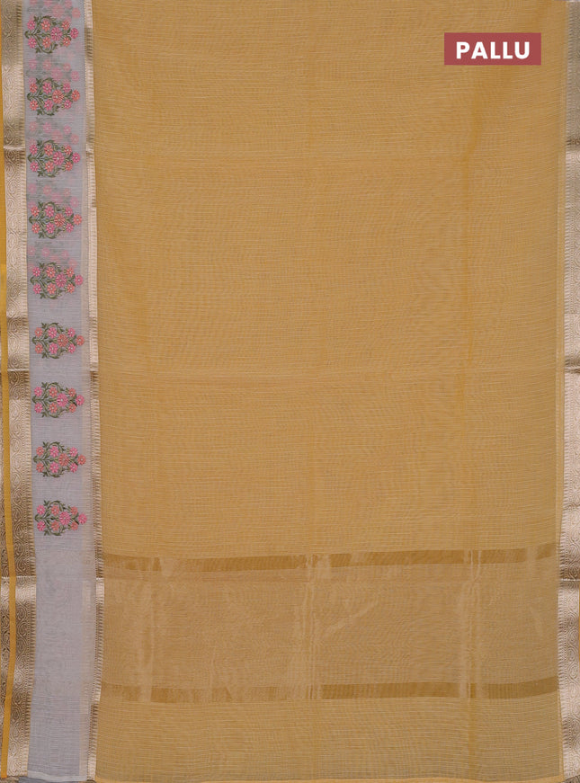 Kota saree yellow and off white with plain body and embroidery work border