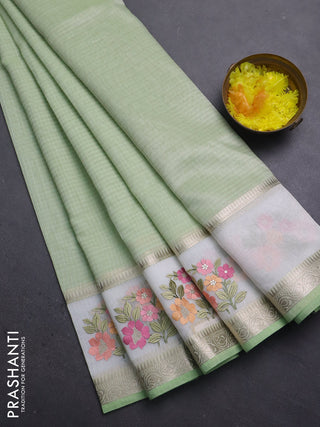 Kota saree pista green and off white with plain body and embroidery work border