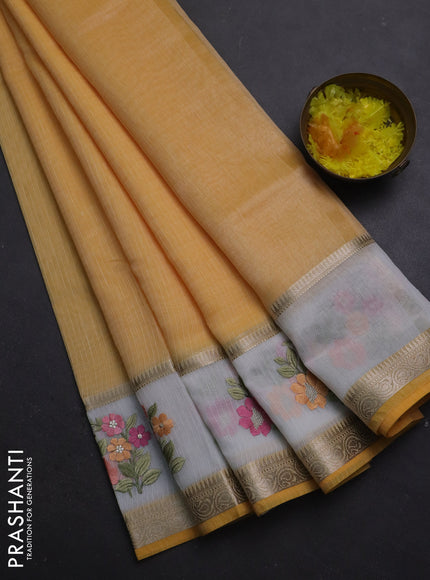 Kota saree yellow and off white with plain body and embroidery work border
