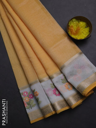 Kota saree yellow and off white with plain body and embroidery work border