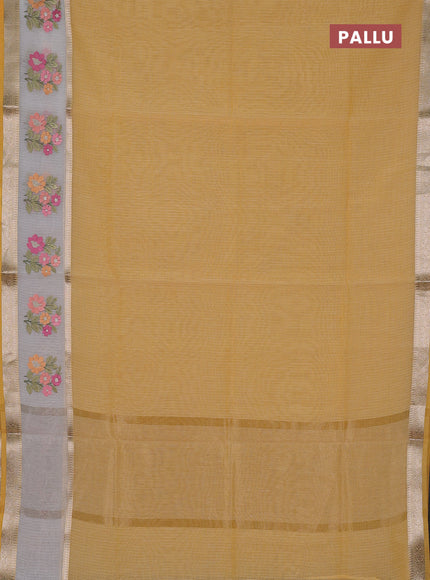 Kota saree yellow and off white with plain body and embroidery work border