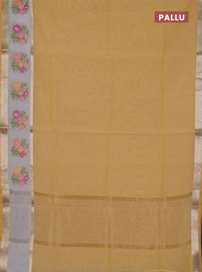Kota saree yellow and off white with plain body and embroidery work border