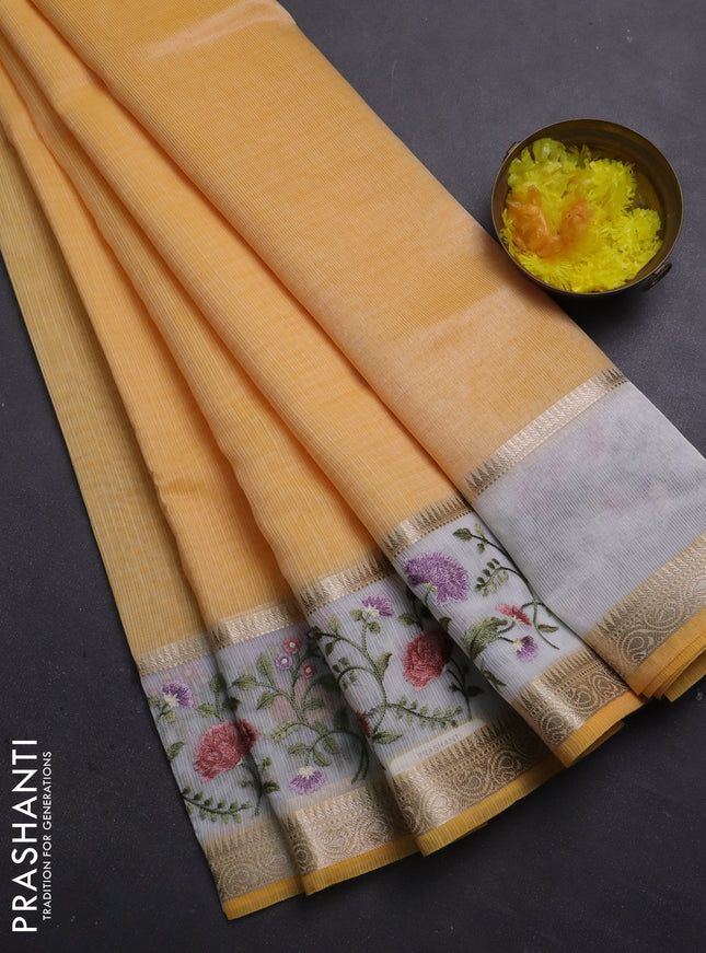 Kota saree yellow and off white with plain body and embroidery work border