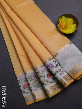 Kota saree yellow and off white with plain body and embroidery work border