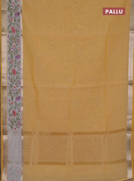 Kota saree yellow and off white with plain body and embroidery work border