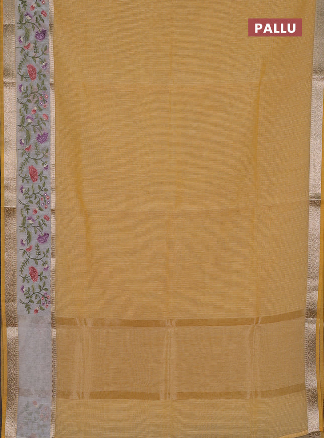 Kota saree yellow and off white with plain body and embroidery work border