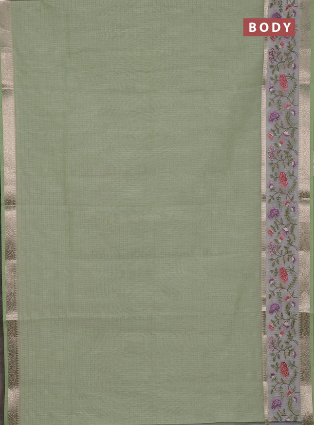 Kota saree pista green and off white with plain body and embroidery work border