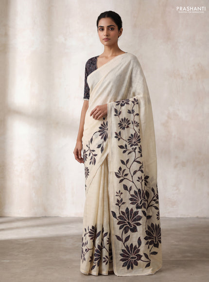 Semi linen tissue saree cream and black with kalamkari applique work and crocia lace work border