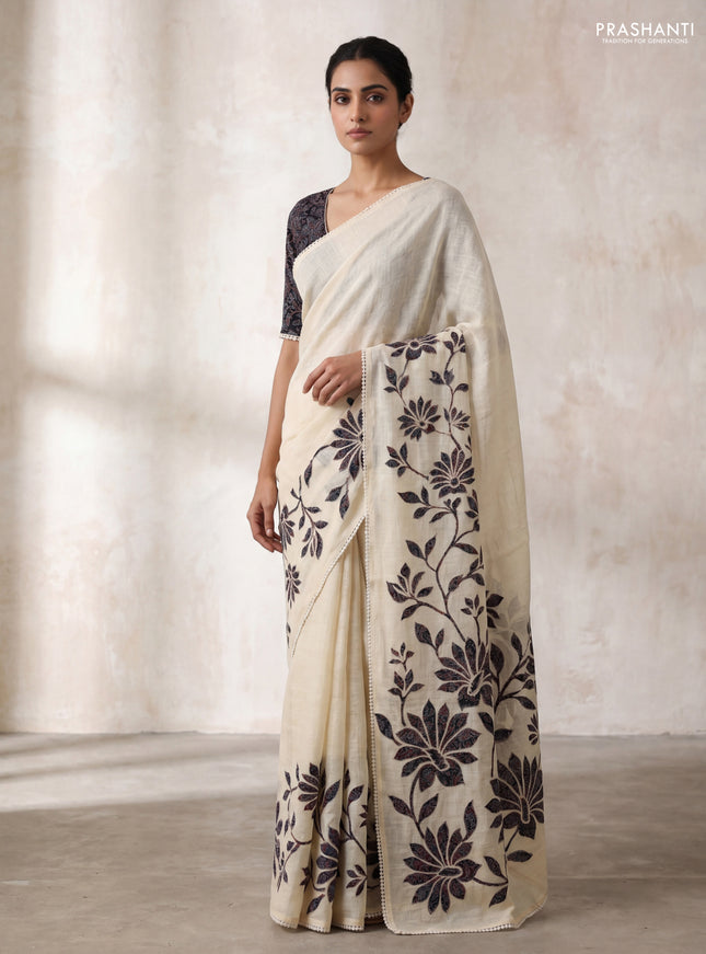 Semi linen tissue saree cream and black with kalamkari applique work and crocia lace work border