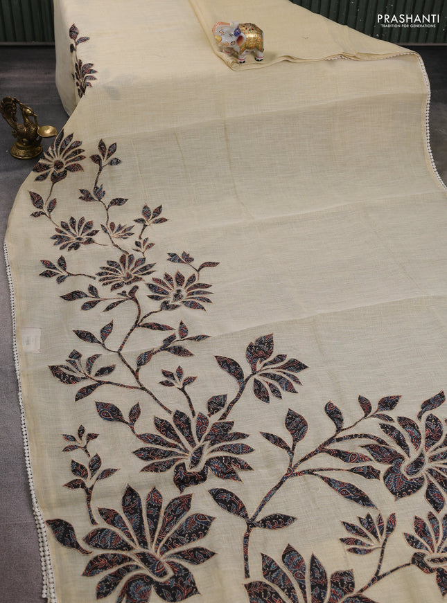 Semi linen tissue saree cream and black with kalamkari applique work and crocia lace work border