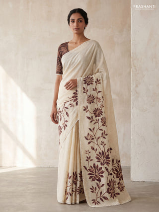 Semi linen tissue saree cream and coffee brown with kalamkari applique work and crocia lace work border