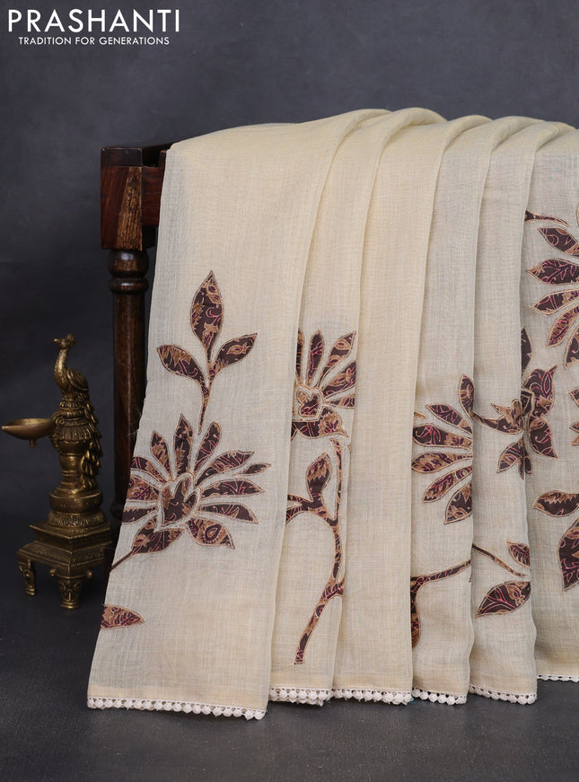 Semi linen tissue saree cream and coffee brown with kalamkari applique work and crocia lace work border
