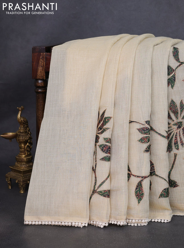 Semi linen tissue saree cream and green with kalamkari applique work and crocia lace work border