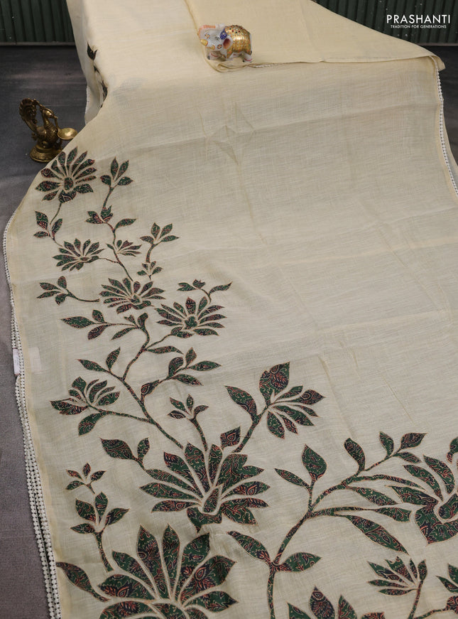 Semi linen tissue saree cream and green with kalamkari applique work and crocia lace work border