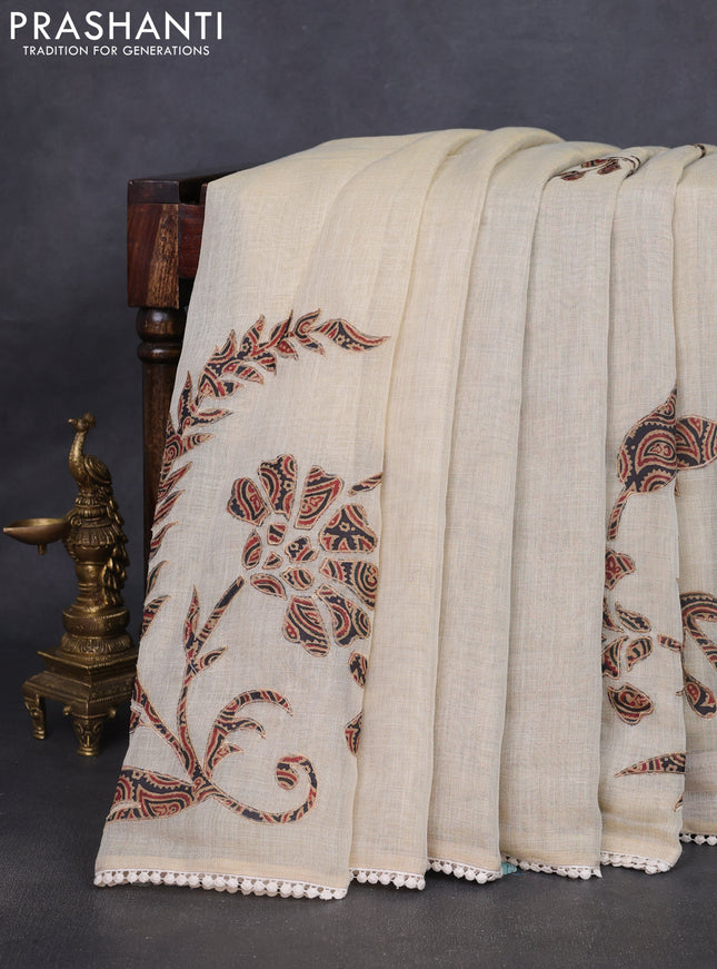 Semi linen tissue saree cream and deep jamun with applique work and crocia lace work border