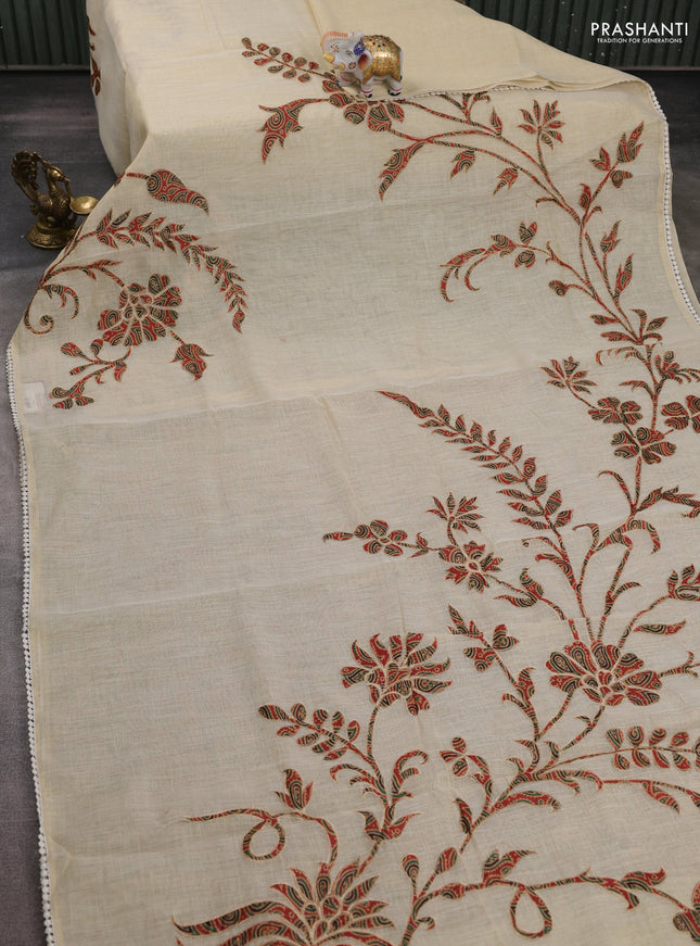 Semi linen tissue saree cream and rustic orange with applique work and crocia lace work border