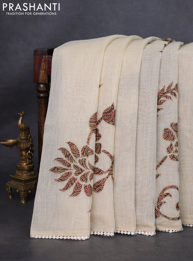 Semi linen tissue saree cream and brown with applique work and crocia lace work border