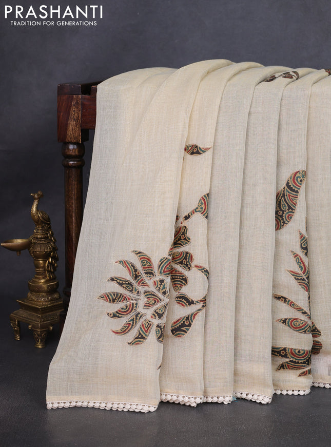 Semi linen tissue saree cream and black with applique work and crocia lace work border
