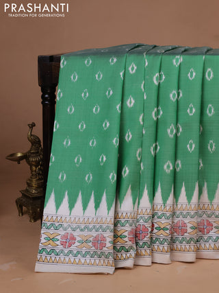 Pochampally silk saree light green and cream with allover ikat woven buttas and madhubani prints