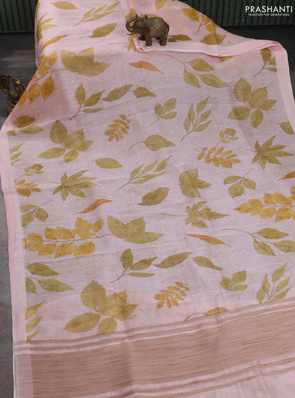 Pure linen silk saree mild peach with allover prints and simple border