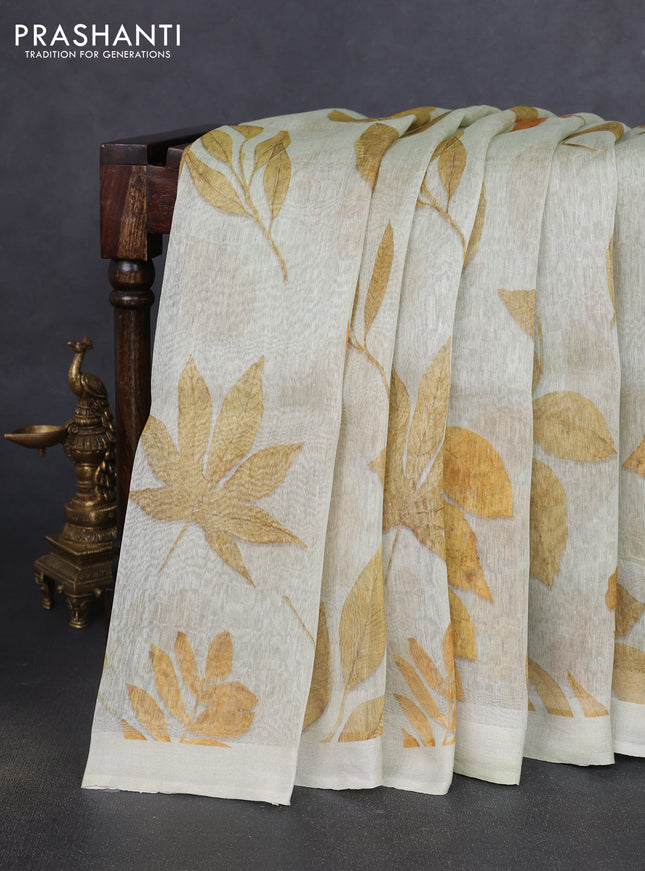 Pure linen silk saree mild pista green and mustard yellow with allover prints and simple border