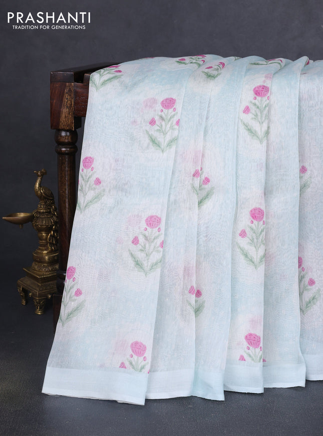 Pure linen silk saree pastel blue with allover floral prints and simple border