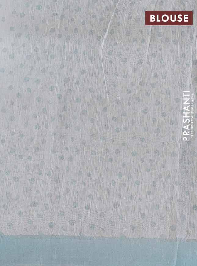 Pure linen silk saree pastel blue with allover floral prints and simple border