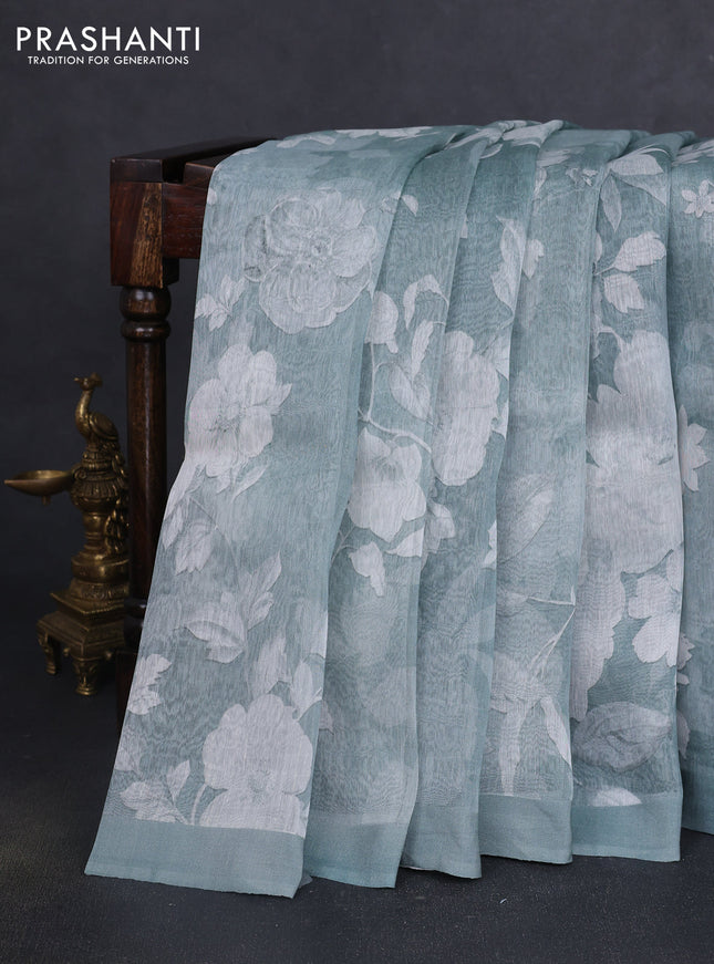 Pure linen silk saree pastel green shade with allover floral prints and simple border