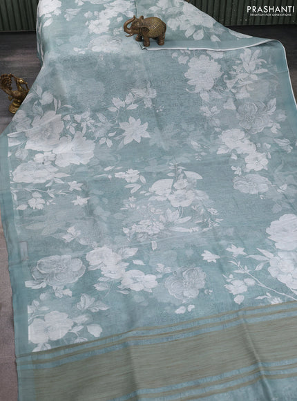 Pure linen silk saree pastel green shade with allover floral prints and simple border