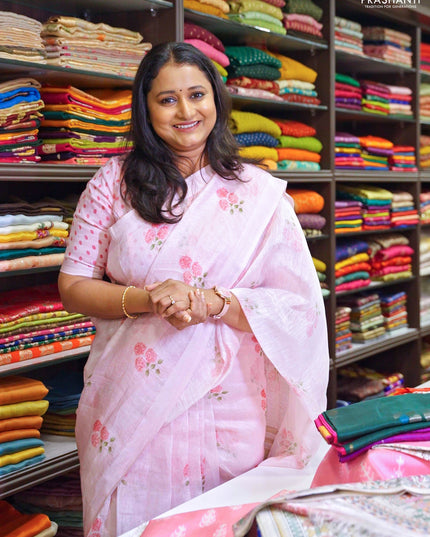 Pure linen silk saree light pink with allover floral prints and simple border