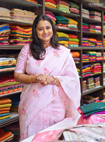 Pure linen silk saree light pink with allover floral prints and simple border