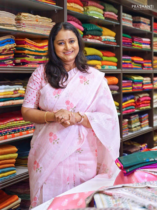 Pure linen silk saree light pink with allover floral prints and simple border