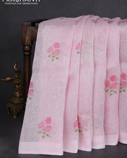 Pure linen silk saree light pink with allover floral prints and simple border