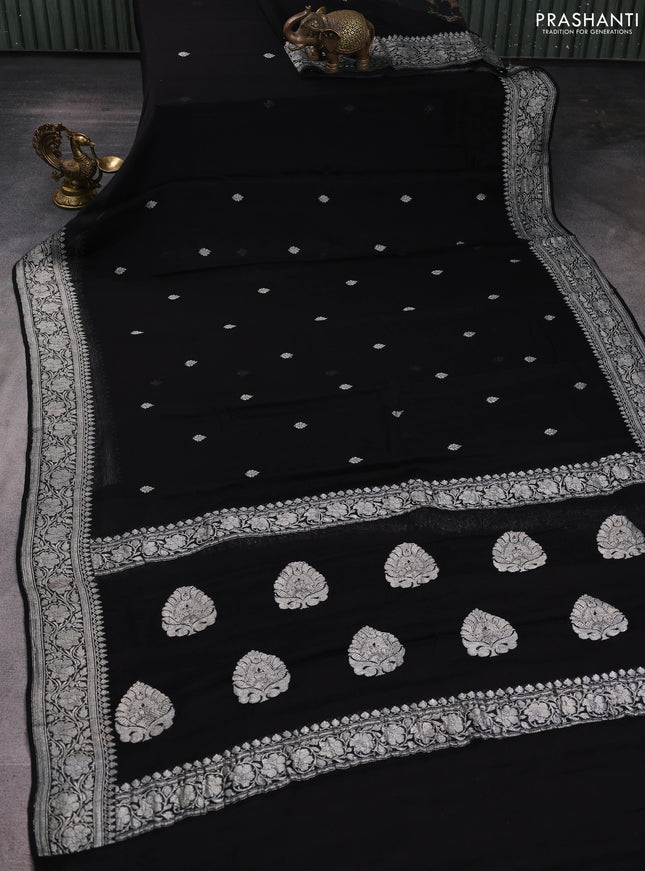 Banarasi chiffon saree black with silver zari woven buttas and floral silver zari woven border