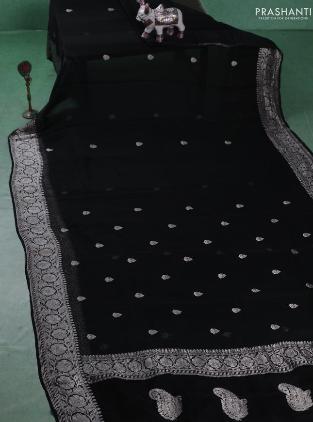 Banarasi chiffon saree black with silver zari woven buttas and floral silver zari woven border
