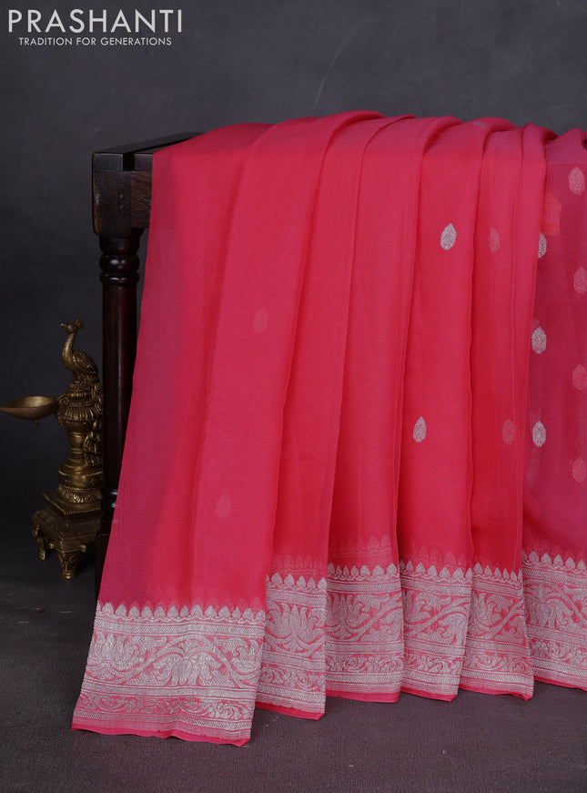 Banarasi chiffon saree peach pink with silver zari woven buttas and floral silver zari woven border