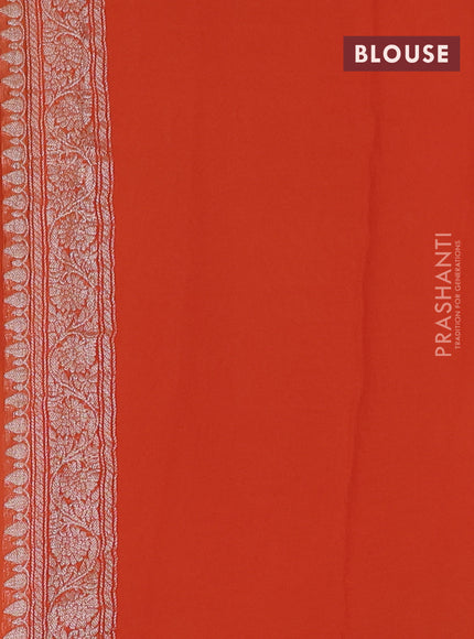 Banarasi chiffon saree orange with silver zari woven buttas and floral silver zari woven border