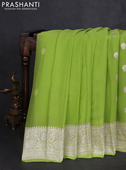 Banarasi chiffon saree pista green with silver zari woven buttas and floral silver zari woven border