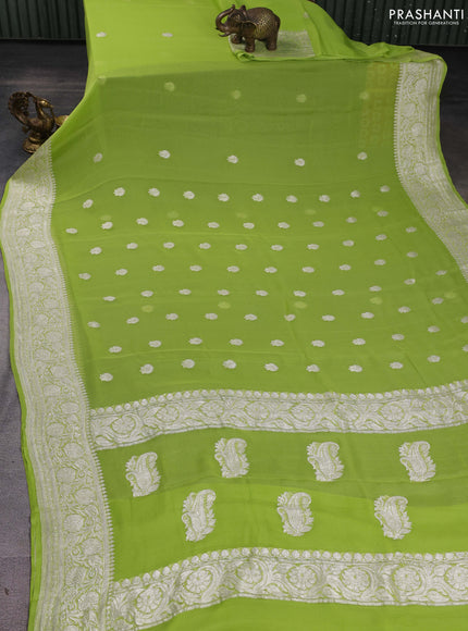 Banarasi chiffon saree pista green with silver zari woven buttas and floral silver zari woven border